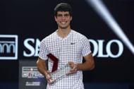 Carlos Alcaraz with the 2021 Next Gen ATP Finals trophy